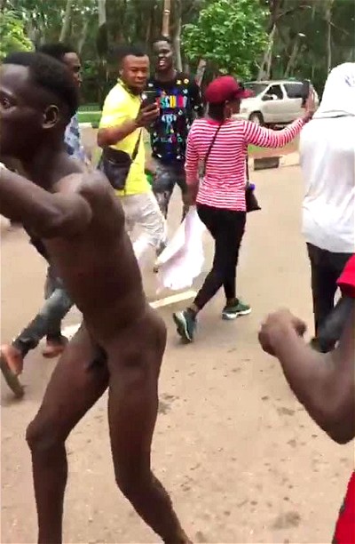 Naked Black Guy Marches in Public road with friends